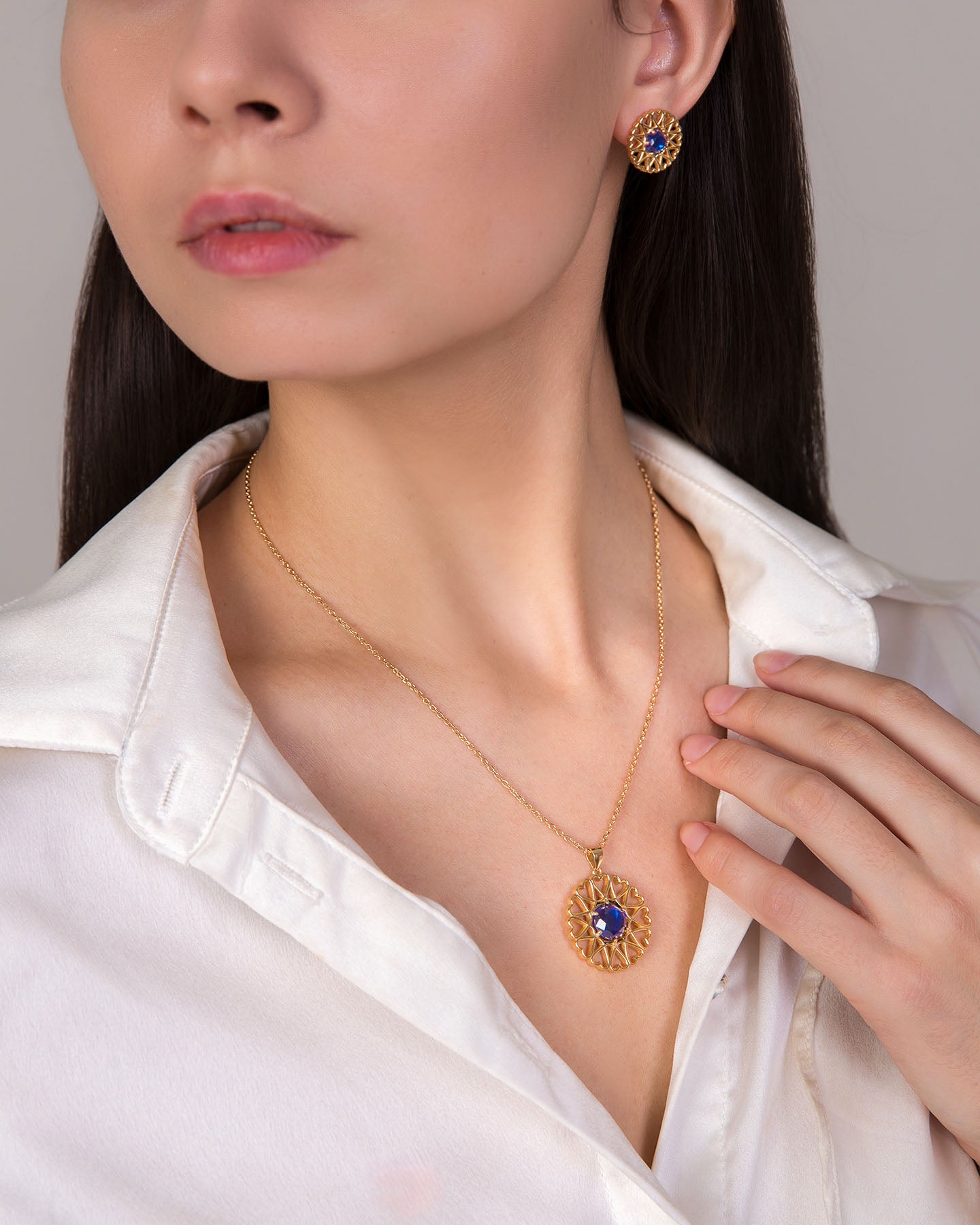 amoare twelve heart small gold plated silver jewellery set of pendant and earrings with sapphire color zirconias