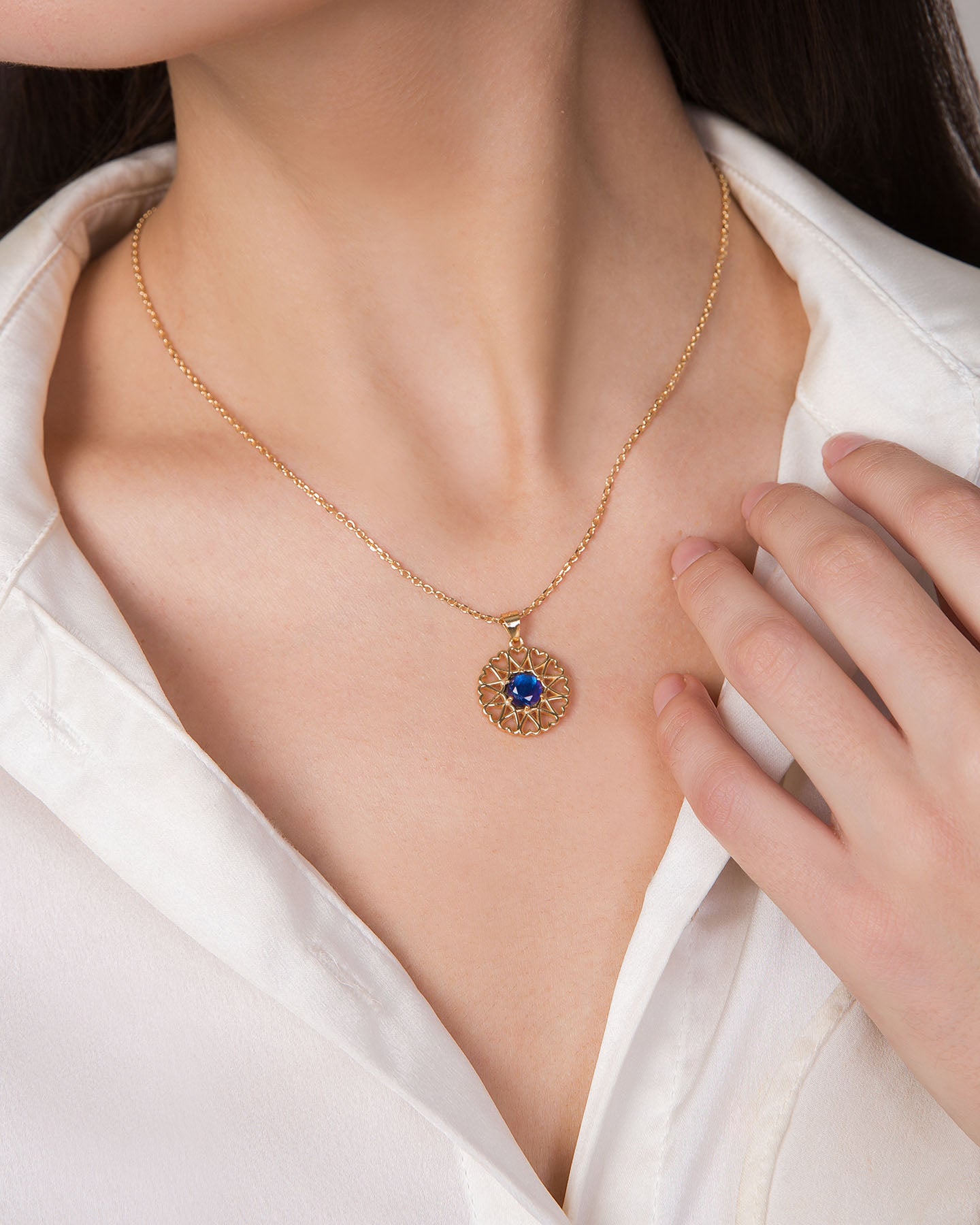 amoare twelve heart small gold plated silver pendant with sapphire color zirconia