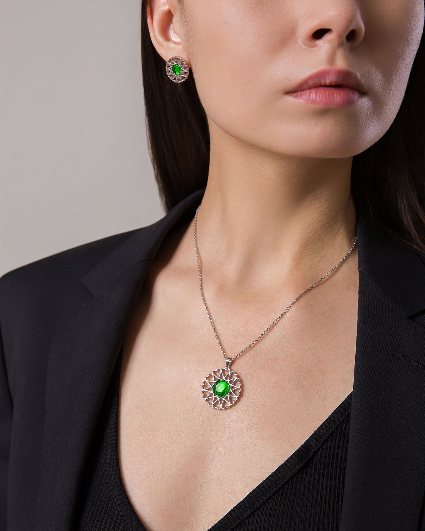 amoare twelve heart silver jewellery set of large pendant and earrings with emerald color cubic zirconias